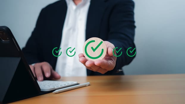 ISO certification and standardization concept, Hand shows sign of top service Quality assurance, Guarantee, Standards, satisfaction, Service experience, Show the standards of products and services.