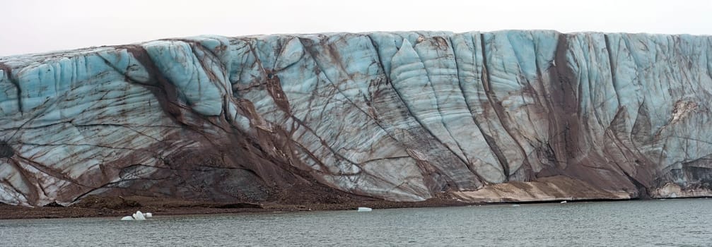 Blue Ice and Dirt in the Negribreen Glacier at Kapp Waldburg in the Svalbard Islands