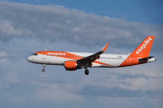 Lisbon, Portugal - September 2, 2023: easyJet Airbus A320-214 passenger plane ascends to landing in Humberto Delgado Airport in Lisbon
