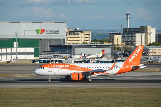 Lisbon, Portugal - September 2, 2023: easyJet Airbus A321-251N passenger plane taxi on runway in Humberto Delgado Airport in Lisbon