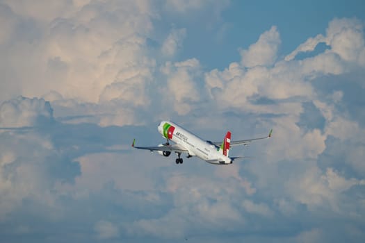 Lisbon, Portugal - September 2, 2023: TAP Air Portugal Airbus A321-251NX passenger plane in sky with clouds after take off in Humberto Delgado Airport in Lisbon