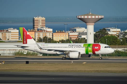 Lisbon, Portugal - September 2, 2023: TAP Air Portugal Airbus A321-251N passenger plane taxi on runway in Humberto Delgado Airport in Lisbon