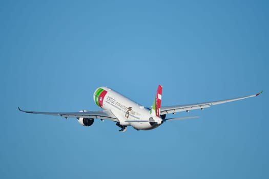 Lisbon, Portugal - September 2, 2023: TAP Air Portugal Airbus A330-941 passenger plane in sky after take off in Humberto Delgado Airport in Lisbon