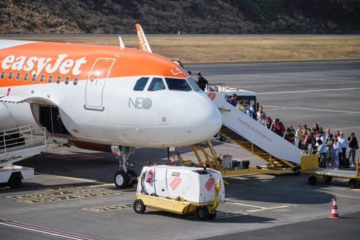 Lisbon, Portugal - September 2, 2023: Passenger boarding easyJet Airbus A321-251N passenger plane in Cristiano Ronaldo Airport in Funchal, Madeira Island