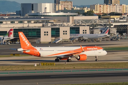 Lisbon, Portugal - September 2, 2023: easyJet Airbus A321-251NX passenger plane taxi on runway in Humberto Delgado Airport in Lisbon