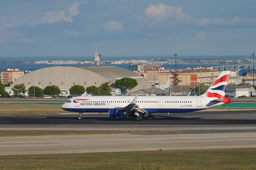 Lisbon, Portugal - September 2, 2023: British Airways Airbus A321-251NX passenger plane taxi on runway in Humberto Delgado Airport in Lisbon