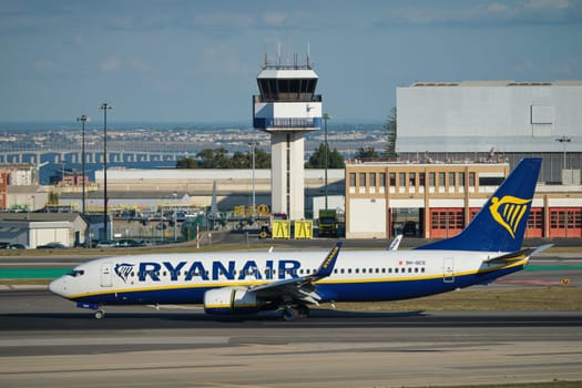 Lisbon, Portugal - September 2, 2023: Ryanair Boeing 737-8AS passenger plane taxi on runway in Humberto Delgado Airport in Lisbon