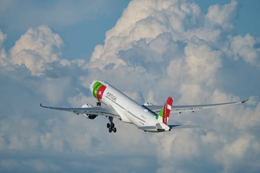 Lisbon, Portugal - September 2, 2023: TAP Air Portugal Airbus A330-941 passenger plane in sky after take off in Humberto Delgado Airport in Lisbon