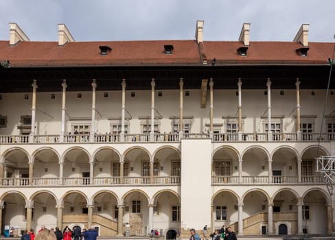 Cracow, Poland - October 1, 2023: The arcaded Renaissance-style courtyard at Wawel Royal Castle on Wawel Hill
