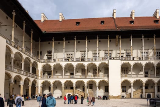 Cracow, Poland - October 1, 2023: The arcaded Renaissance-style courtyard at Wawel Royal Castle on Wawel Hill