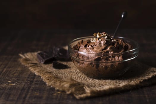 close up delicious chocolate mousse ready be served. High resolution photo
