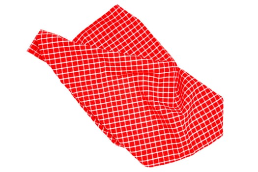 Closeup of a red and white checkered napkin or tablecloth texture isolated on white background. Kitchen accessories. Top view.