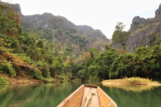 Spectacular view from the boat on the way into Kong Lor Cave, a tourist attraction on the Thakhek Motorbike Loop, Laos 2023