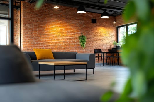 Contemporary industrial lounge with exposed brick walls, modern furniture, and ambient lighting.