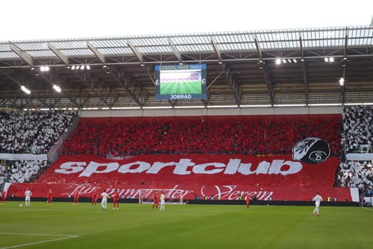 Choreography of the Freiburg fan stand with banner "Sportclub Freiburg für immer der Verein"" - at the match of the 1st FBL: 24-25: 1st FBL: 24-25: 9th Sptg. SC Freiburg - FSV Mainz 05  DFL REGULATIONS PROHIBIT ANY USE OF PHOTOGRAPHS AS IMAGE SEQUENCES AND/OR QUASI-VIDEONann  Photo: Joachim Hahne/johapress"
