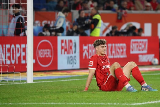 After the 0-0 draw,substitute Noah Weißhaupt (SC Freiburg) sits disappointed on the pitch during the match of the 1st FBL: 24-25: 1st FBL: 24-25: 9th Sptg. SC Freiburg - FSV Mainz 05  DFL REGULATIONS PROHIBIT ANY USE OF PHOTOGRAPHS AS IMAGE SEQUENCES AND/OR QUASI-VIDEONann  Photo: Joachim Hahne/johapress