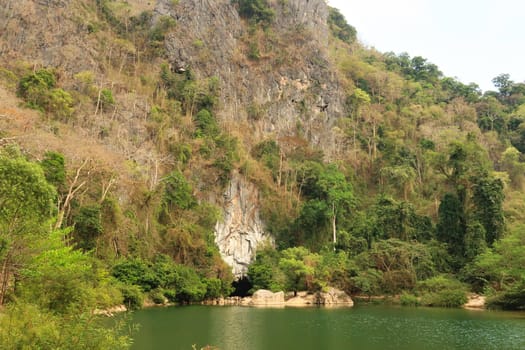 Spectacular view onto the entrance of the Kong Lor Cave, a tourist attraction on the Thakhek Motorbike Loop, Laos 2023
