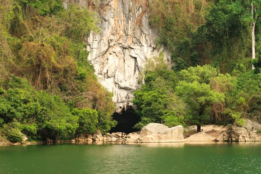 View onto the entrance of the Kong Lor Cave, a tourist attraction on the Thakhek Motorbike Loop, Laos 2023