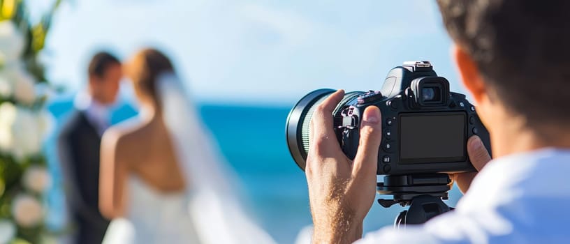 Wedding photographer focuses on capturing a special moment between a bride and groom by the sea.