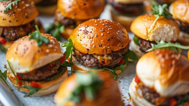 Rotating plate of gourmet sliders in a top-down perspective