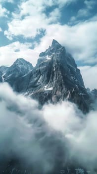 Rocky mountain peaks piercing the clouds