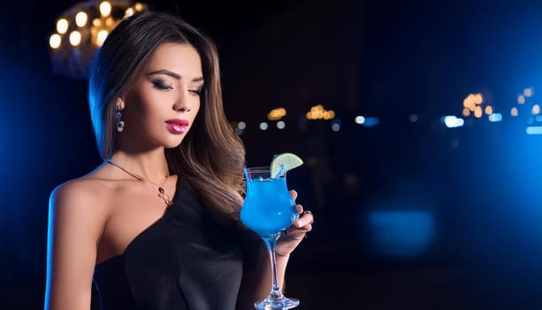 gorgeous woman drinking blue cocktail, AI generated image