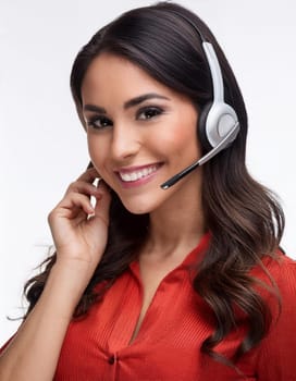 beautiful smiling woman with headset in a call centre