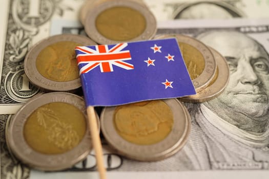 Australian flag on coin and banknote money, finance trading investment business currency concept.