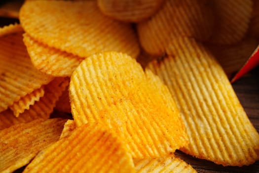 Potato chips , delicious BBQ seasoning spicy for crips, thin slice deep fried snack fast food.