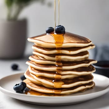 Elegance in Simplicity: Pancakes Drizzled with Syrup