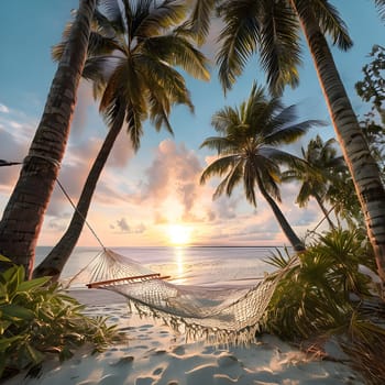Sunset Serenity: Hammock Between Palm Trees on a Tropical Beach