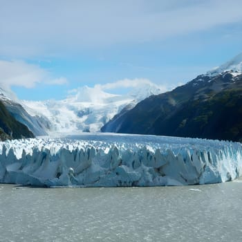 Fox Glacier’s ancient ice reflects a mesmerizing play of light, showcasing its icy splendor. This pristine, frozen landscape embodies the breathtaking, untouched beauty of New Zealand’s rugged wilderness