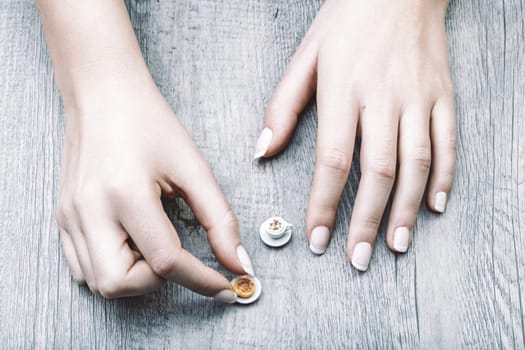 Tiny breakfast items depict the limitations imposed by dietary restrictions, intolerance, and cost. Combined with time scarcity, this image symbolizes the frustration of an unfulfilled morning