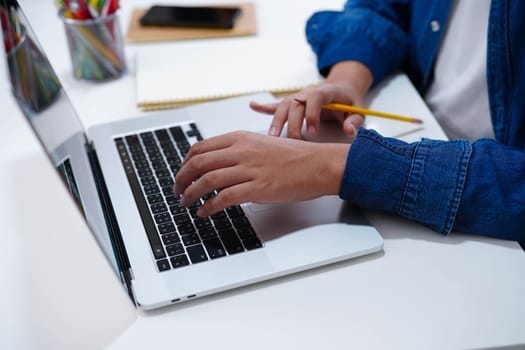 Teenage using tablet for communication, search data internet website to learn.