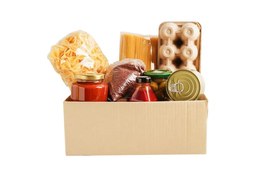 Foodstuffs in donation box isolated on white background with clipping path for volunteer to help people.