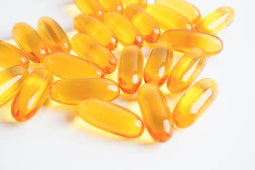 Fish oil or Cod liver oil gel in capsules with omega 3 vitamins, supplementary healthy food