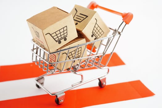 Online shopping, Shopping cart box on Austria flag, import export, finance commerce.