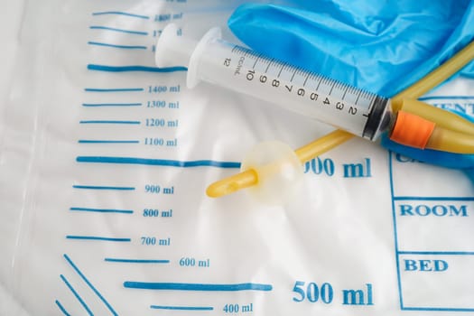 Foley catheter and urine drainage bag collect urine for disability or patient in hospital.