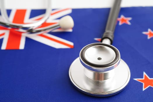 New Zealand flag with black stethoscope, Business and finance concept.
