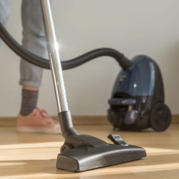 woman cleaning room with vacuum cleaner. Resolution and high quality beautiful photo