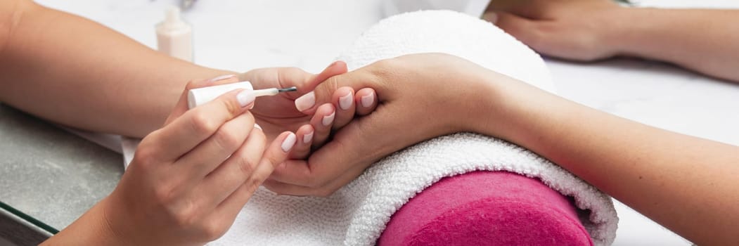 woman doing her manicure salon. Resolution and high quality beautiful photo
