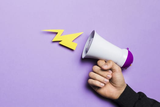 woman s hand showing power thunder with megaphone. Resolution and high quality beautiful photo