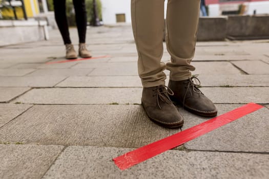 woman queue outdoors with tape. Resolution and high quality beautiful photo