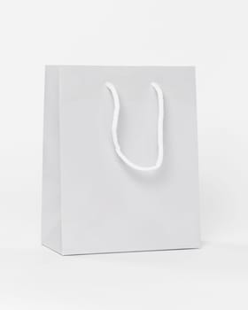 white paper shopping bag with handles. Resolution and high quality beautiful photo