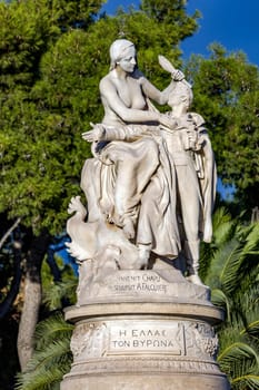 Statue of Lord Byron, Athens. On the side of the Zappeion Park, on a white pedestal, there is a monument to Lord Byron and his muse Hellas.