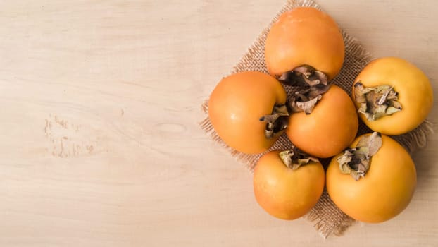 top view tasty persimmons with copy space. Resolution and high quality beautiful photo