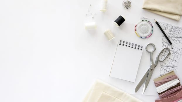top view sewing essentials with textiles copy space. Resolution and high quality beautiful photo