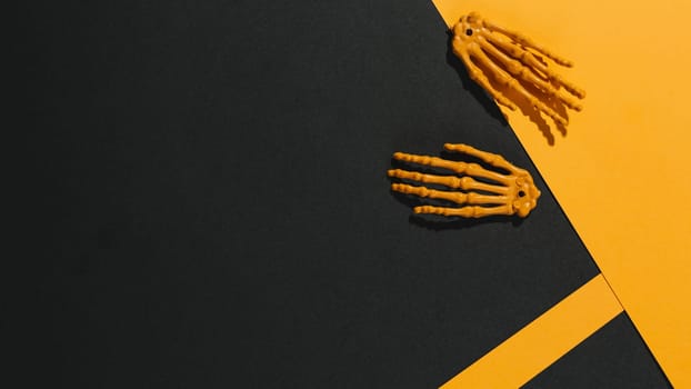 two skeleton hands orange paper. Resolution and high quality beautiful photo