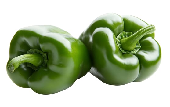 A duo of glossy green bell peppers, highlighting their vibrant color and smooth texture on a plain background. Isolated on white background.
