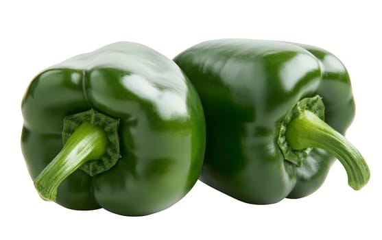 Two fresh green bell peppers on a clean background, showcasing their glossy texture and vibrant color. Isolated on white background.